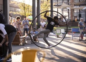 Street performer in a ring at Camp North End Charlotte NC